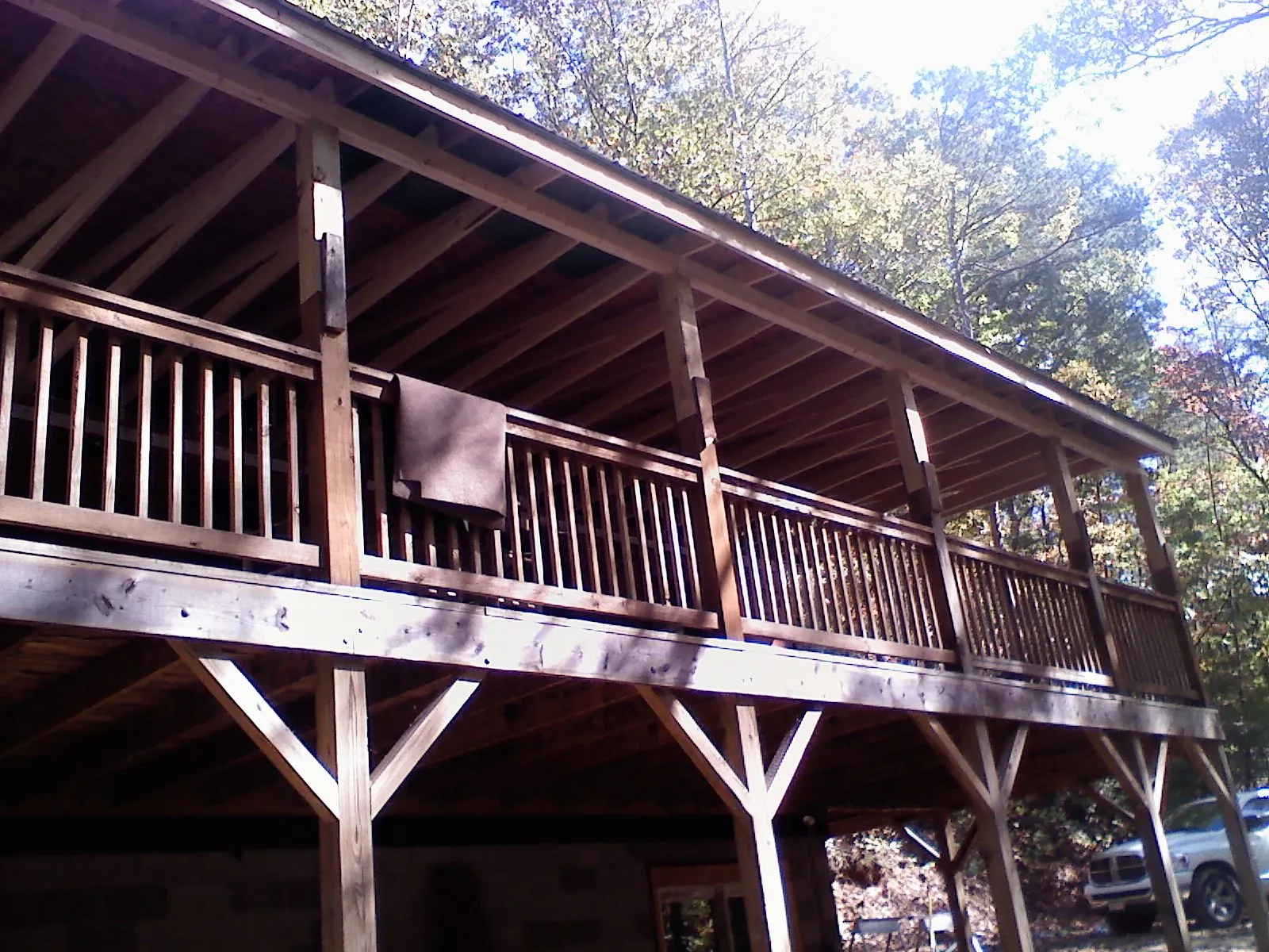 Timber framing under a new elevated porch and deck — Roof Leak Repair in Neosho by Roofing Brothers